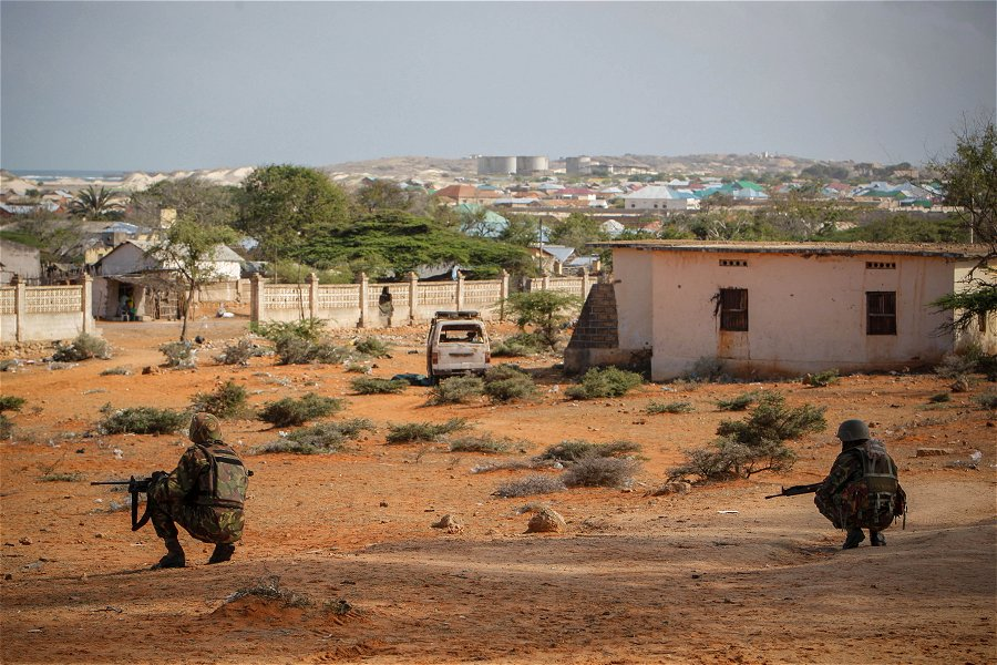Soldiers looking for unexploded ordenance &copy;Amisom Public Information